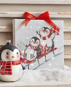 Sledding Penguins 6 Inch Tabletop LED Lighted Print On Canvas With Stand