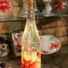 Lighted Wine Bottle With Swirling Glitter Hope Poinsettia Design With Cardinals Snow Globe -Home Decoration Onsale hope
